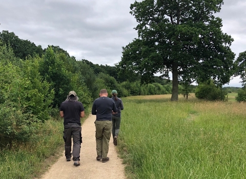 Men walking at Bay Meadows